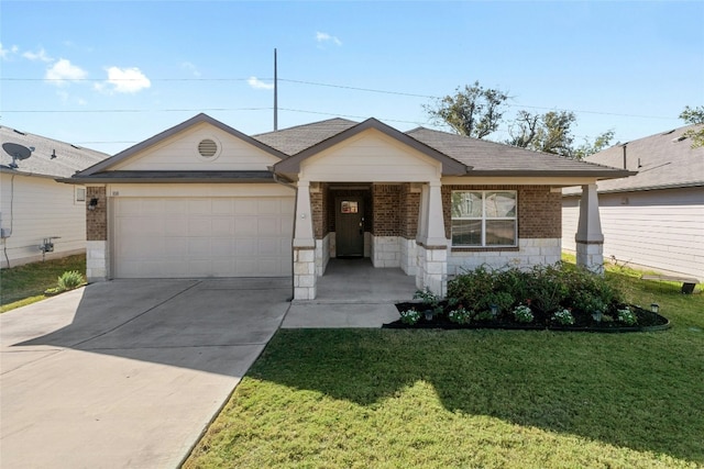 ranch-style house featuring covered porch, a garage, and a front lawn