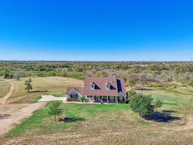 birds eye view of property with a rural view