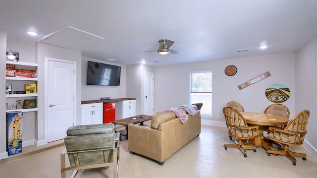 living room featuring ceiling fan