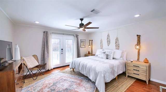 bedroom with access to exterior, hardwood / wood-style flooring, ceiling fan, and crown molding