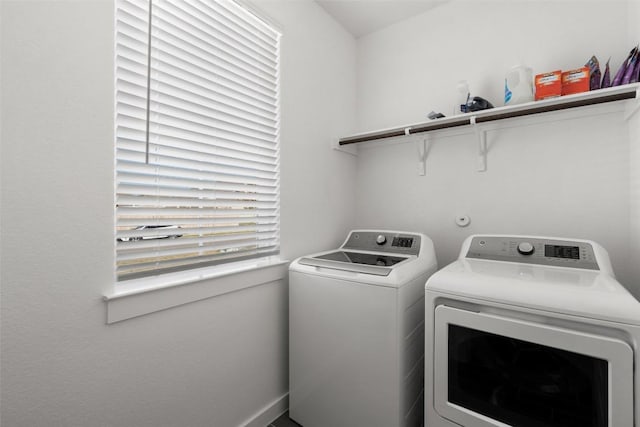 laundry room with laundry area and separate washer and dryer