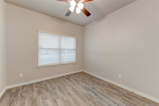 unfurnished room featuring ceiling fan and light hardwood / wood-style floors