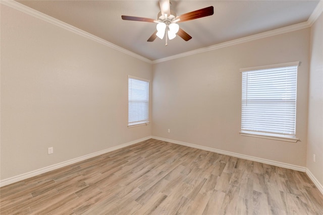 empty room with plenty of natural light, ceiling fan, ornamental molding, and light hardwood / wood-style flooring