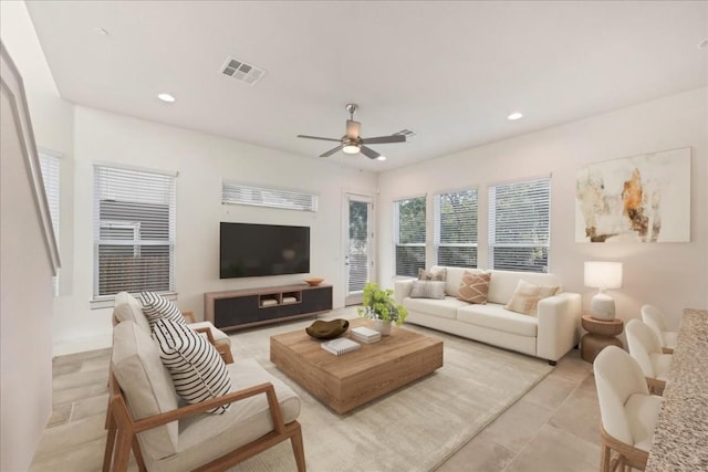 living room with ceiling fan