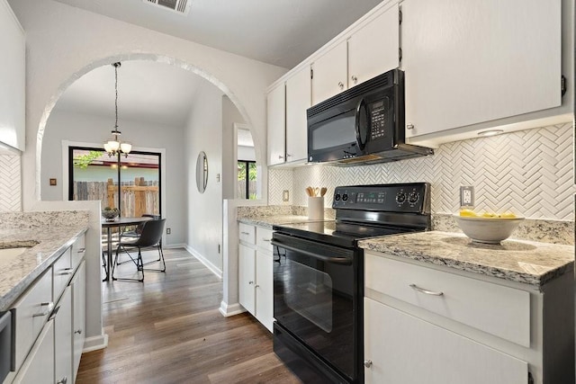 kitchen with dark hardwood / wood-style flooring, backsplash, black appliances, decorative light fixtures, and white cabinets