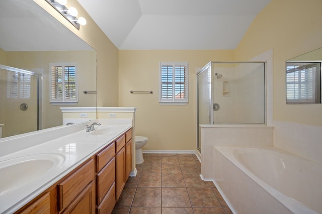 full bathroom with vanity, plus walk in shower, tile patterned floors, vaulted ceiling, and toilet