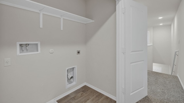 laundry room featuring washer hookup, hookup for an electric dryer, hookup for a gas dryer, and wood-type flooring