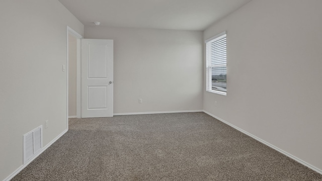 empty room with carpet floors