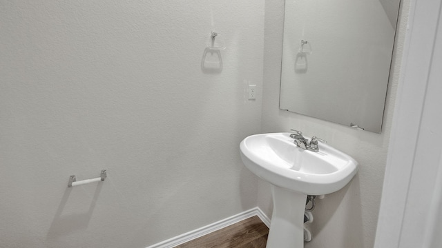 bathroom featuring hardwood / wood-style flooring