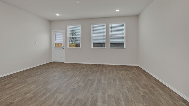 empty room featuring wood-type flooring