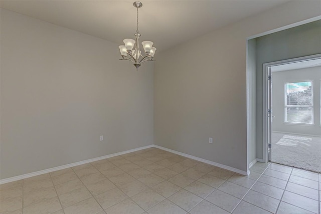 401 Bonham Loop, Georgetown, TX 78633 - empty room featuring baseboards, a notable chandelier, and light tile patterned floors