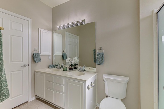 401 Bonham Loop, Georgetown, TX 78633 - full bath featuring a sink, tile patterned floors, toilet, and double vanity