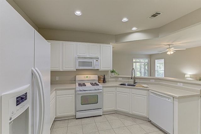 kitchen featuring ceiling fan, white cabinetry, white appliances, and light tile patterned floors