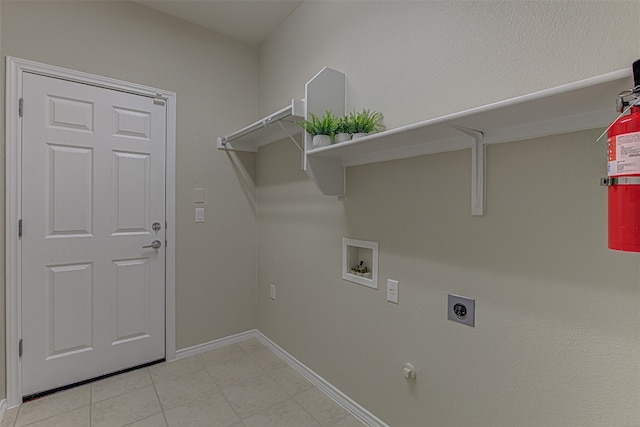 laundry area with electric dryer hookup, gas dryer hookup, and hookup for a washing machine