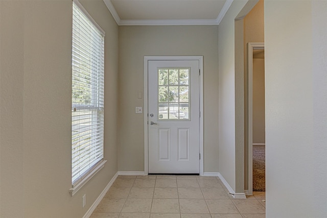 doorway with crown molding and light tile patterned flooring