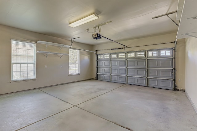 garage featuring a garage door opener