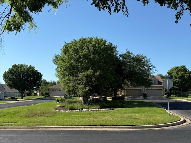 401 Bonham Loop, Georgetown, TX 78633 - obstructed view of property featuring a residential view and a front yard