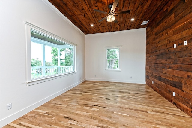 empty room with light hardwood / wood-style flooring, ceiling fan, wooden ceiling, and crown molding