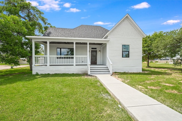 view of front of house featuring a front lawn and a porch