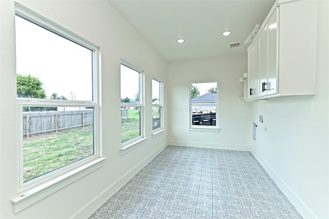 view of unfurnished sunroom