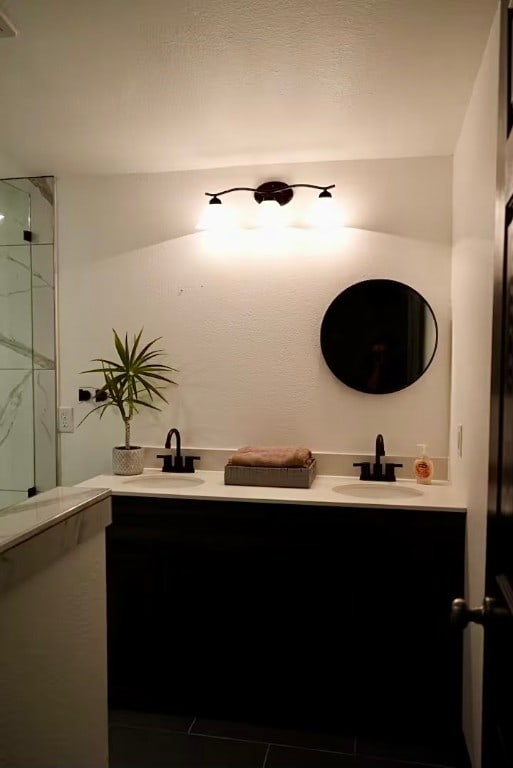 bathroom with vanity and tile patterned floors