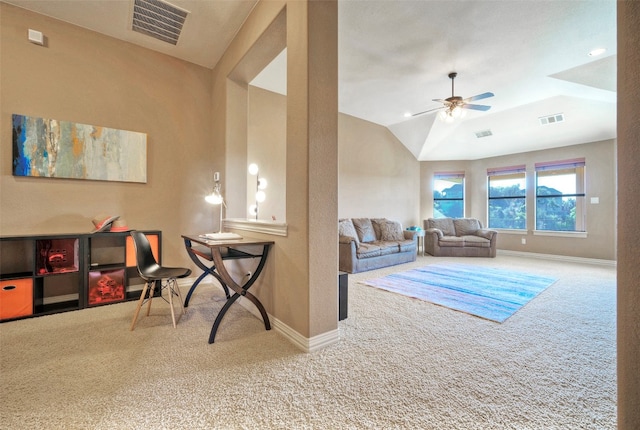 living room featuring carpet, ceiling fan, and lofted ceiling