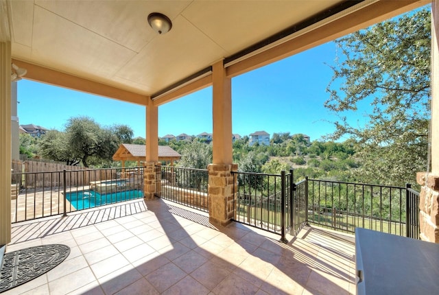 view of patio / terrace featuring a fenced in pool