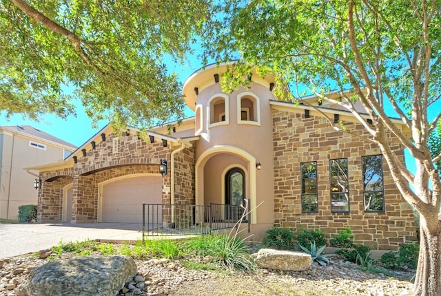 view of front of home with a garage