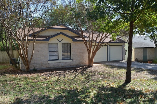 single story home featuring a garage