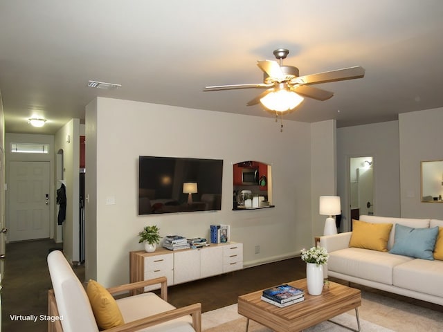 living room with ceiling fan