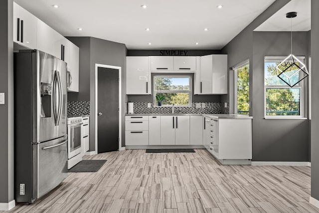 kitchen with stainless steel fridge with ice dispenser, tasteful backsplash, white cabinetry, and hanging light fixtures