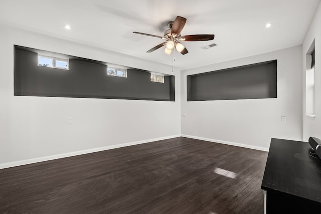 interior space featuring dark hardwood / wood-style flooring and ceiling fan