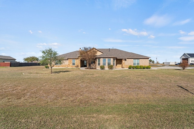 ranch-style house with a front yard