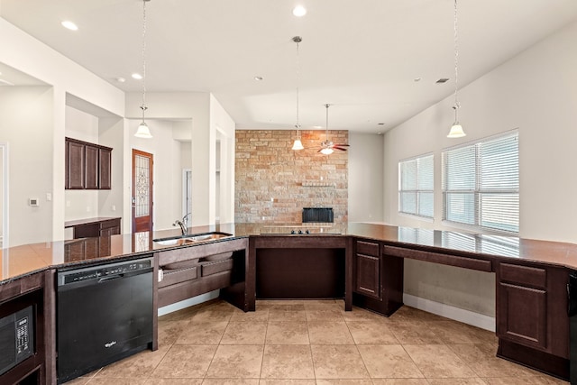 kitchen with sink, decorative light fixtures, ceiling fan, and black appliances