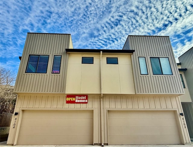 view of property featuring a garage