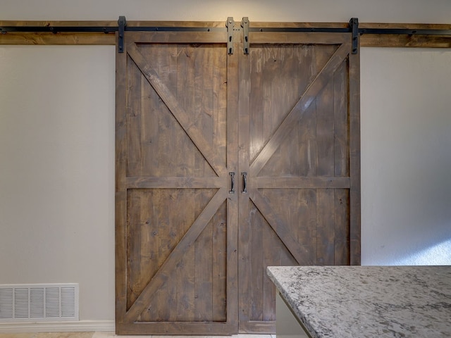 interior details with a barn door