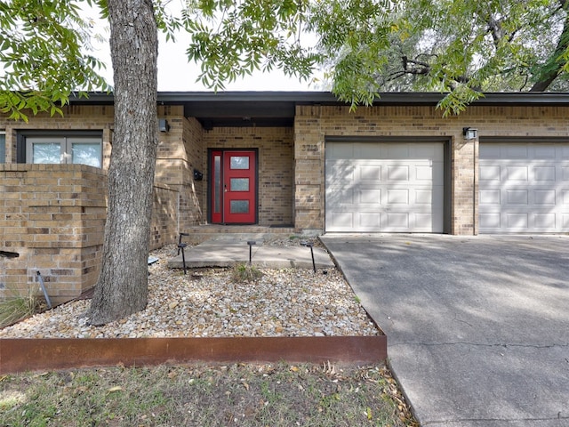 entrance to property with a garage