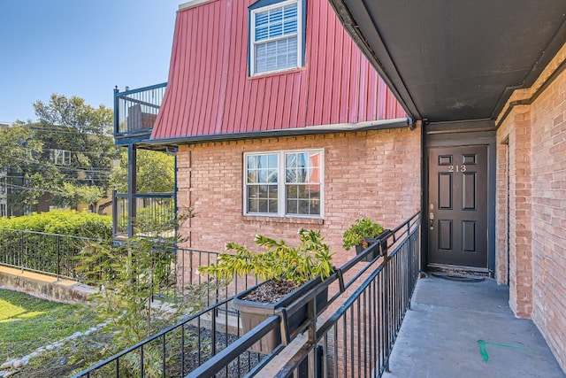 property entrance with a balcony