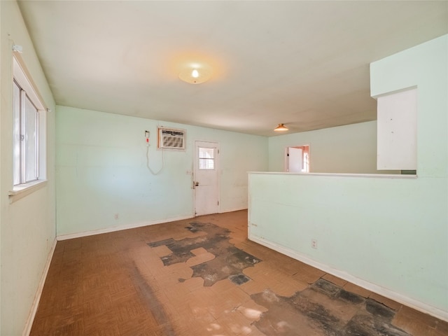 empty room featuring a wall unit AC