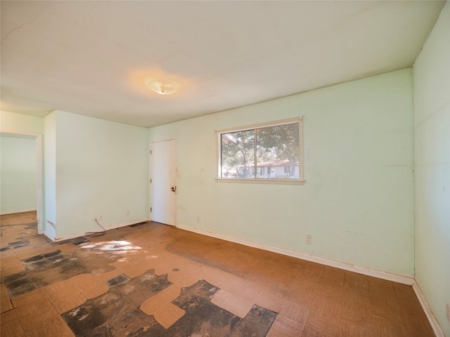 empty room featuring parquet floors