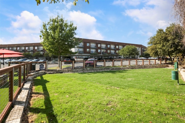 surrounding community featuring a lawn