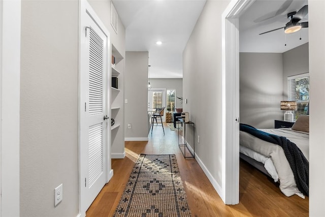 2505 Thornton Rd Unit 1112, Austin, TX 78704 - hallway with wood finished floors and recessed lighting