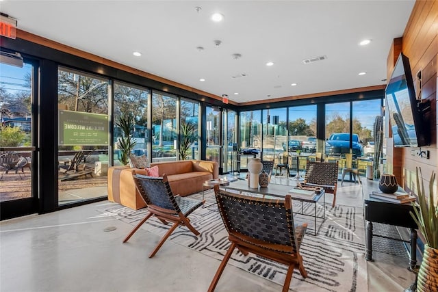 2505 Thornton Rd Unit 1112, Austin, TX 78704 - sunroom with finished concrete floors, recessed lighting, and floor to ceiling windows