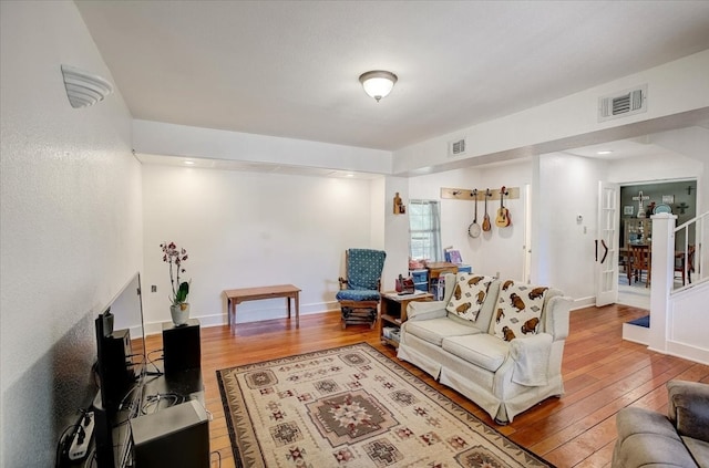 living room featuring wood-type flooring