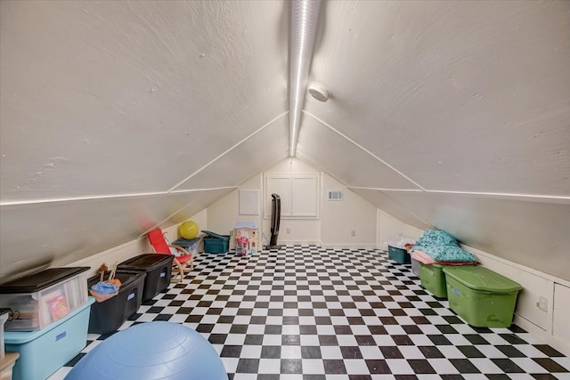 additional living space with vaulted ceiling