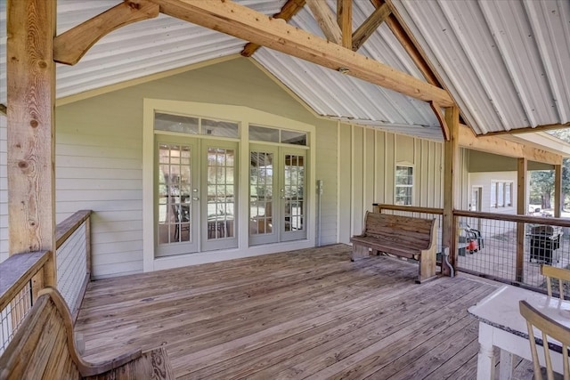 wooden deck featuring french doors