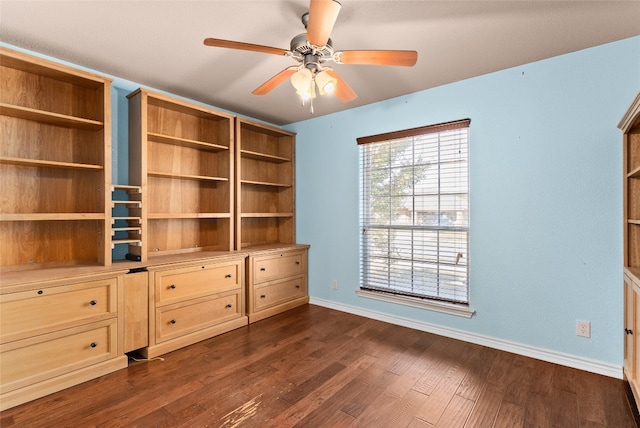 interior space featuring ceiling fan and dark wood-type flooring