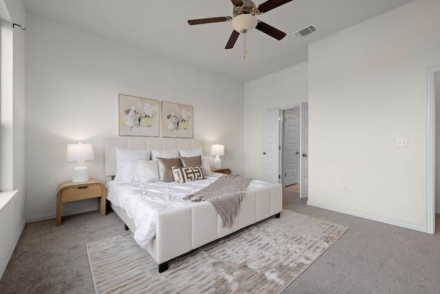 carpeted bedroom with ceiling fan