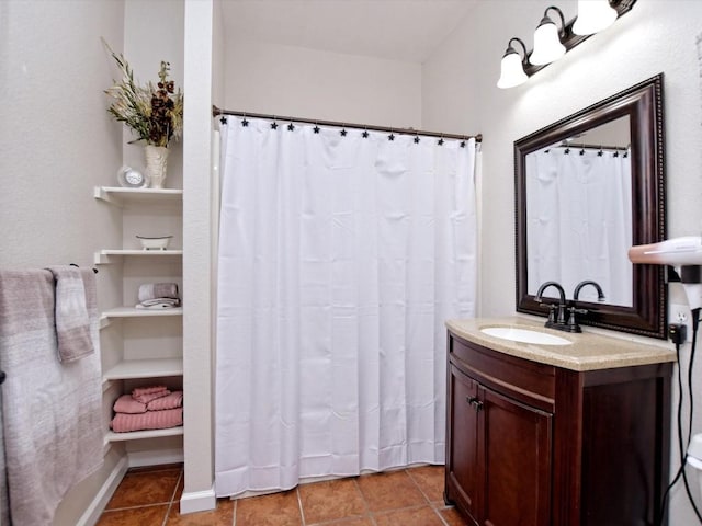 bathroom with vanity and tile patterned floors