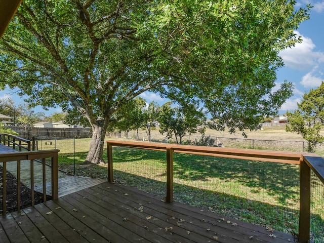 deck featuring a lawn